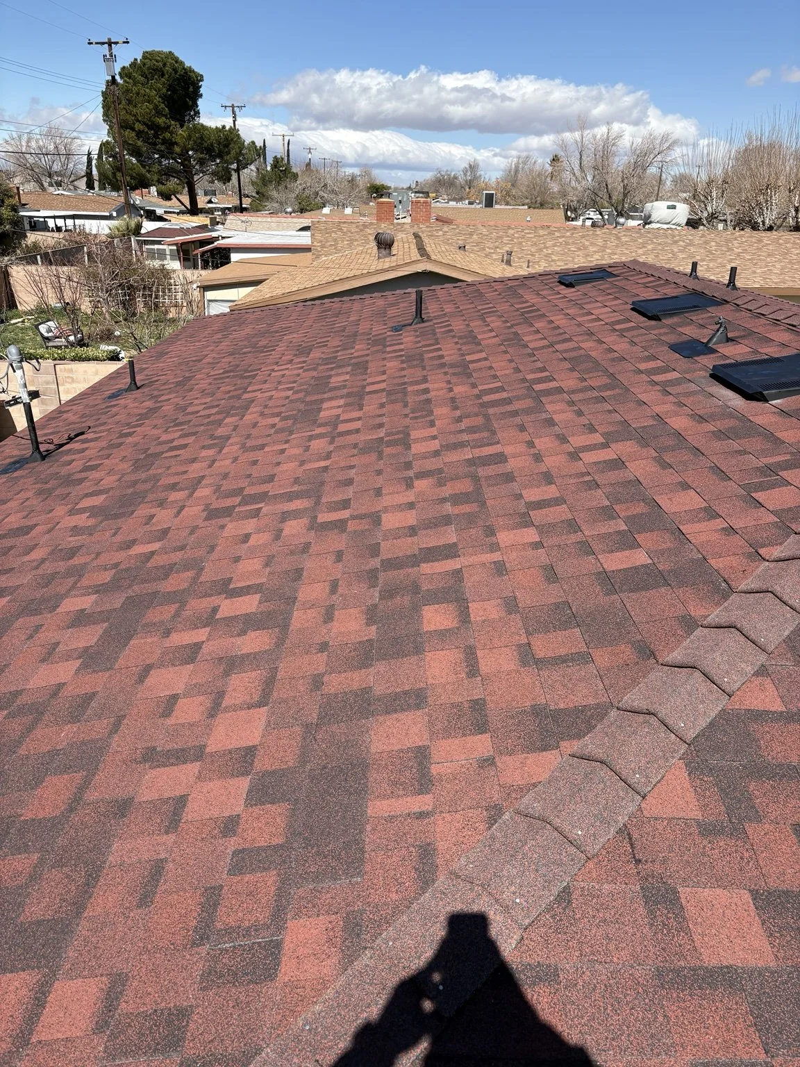 Completed shingle roof replacement by American Made Construction in North Idaho.