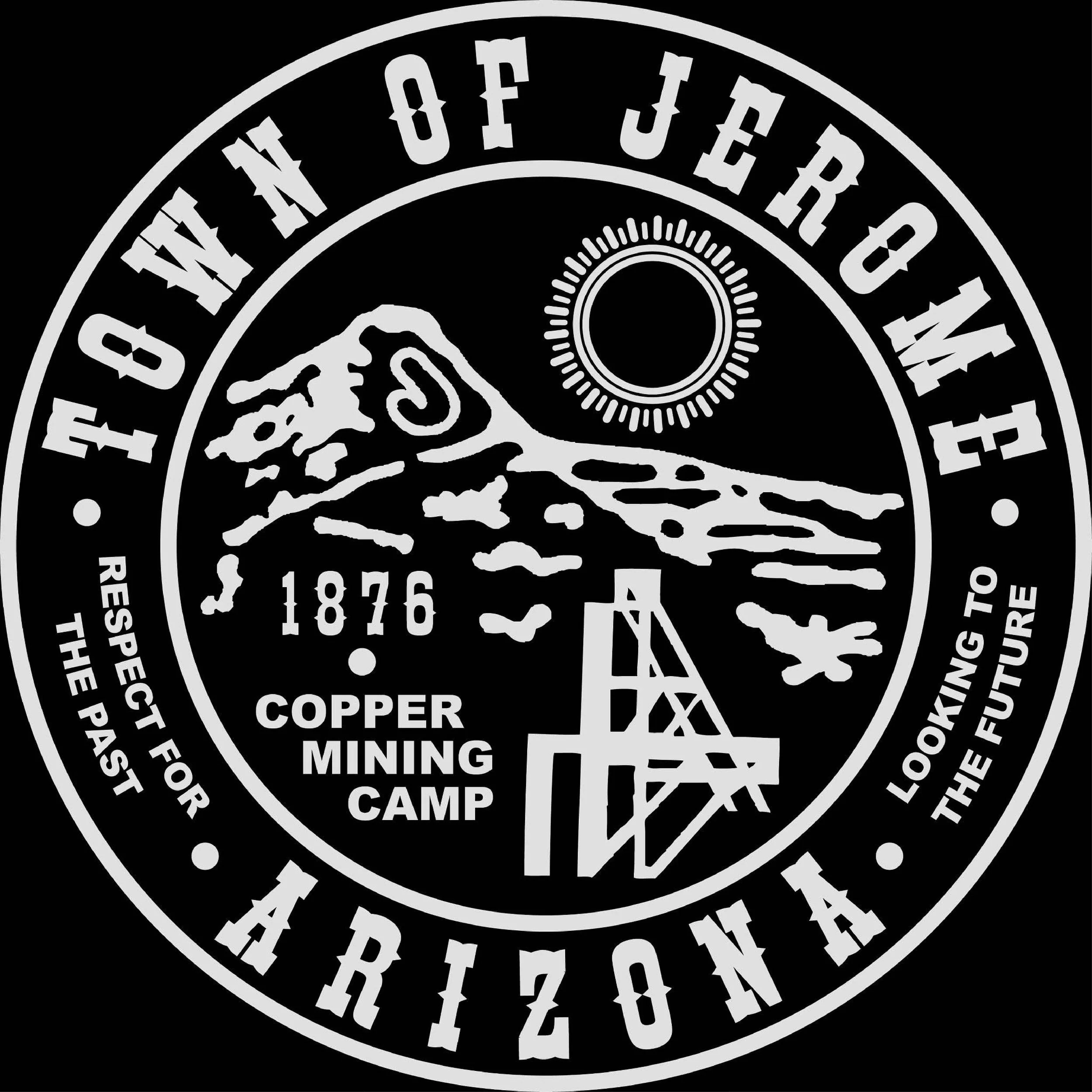 Close-up of a circular emblem with the words 'Town of Jerome' at the top