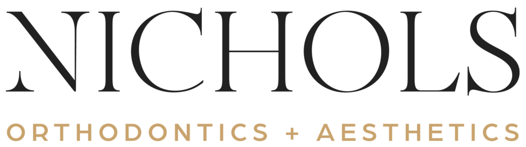 Logo of Nichol's Orthodontics and Aesthetics with black and beige text.