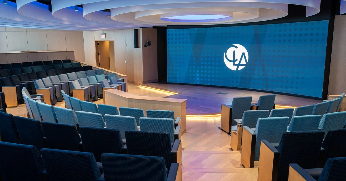 auditorium with blue screen and blue seats