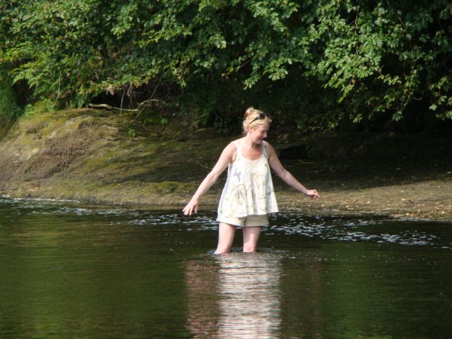 Yoga student swimming in water
