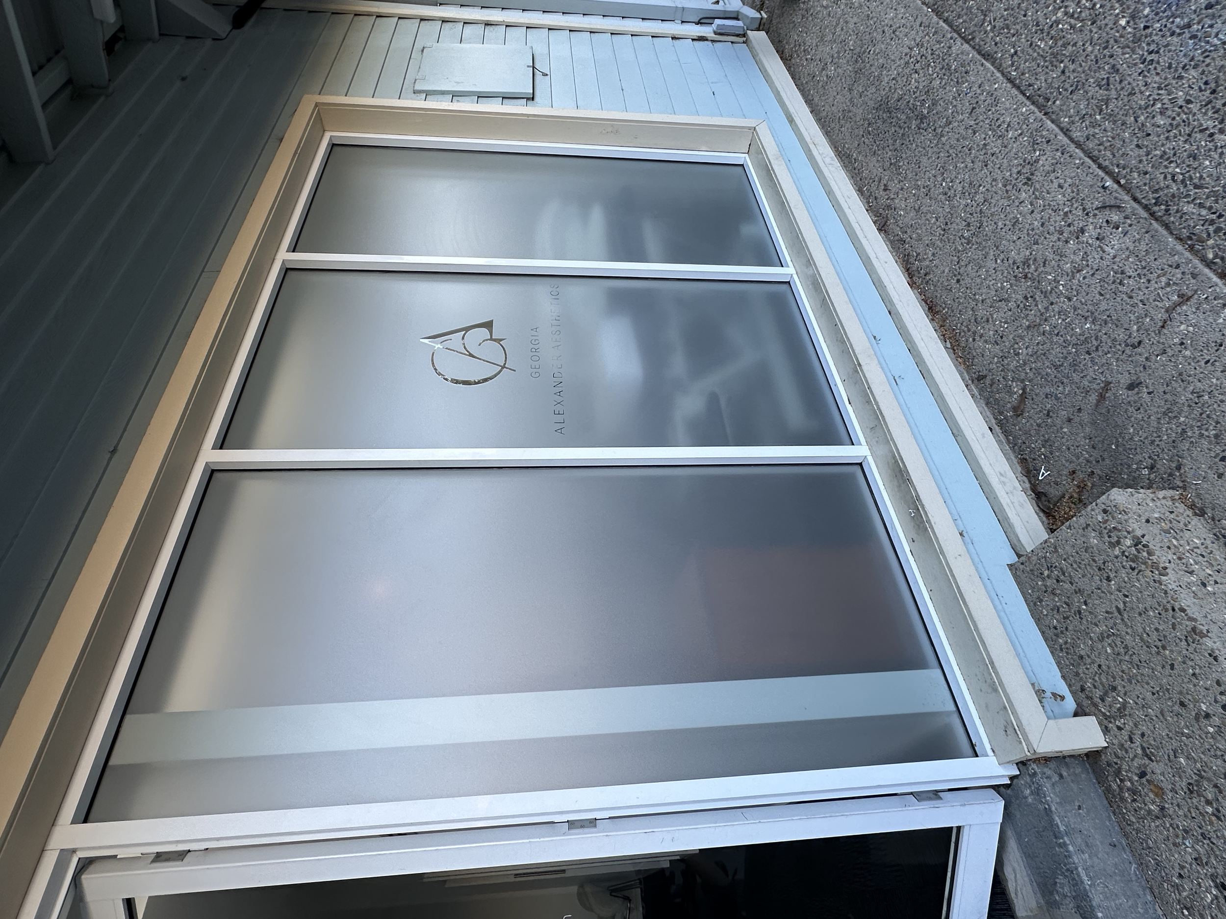 Alexander Aesthetics – Window frosting and cut decals.
