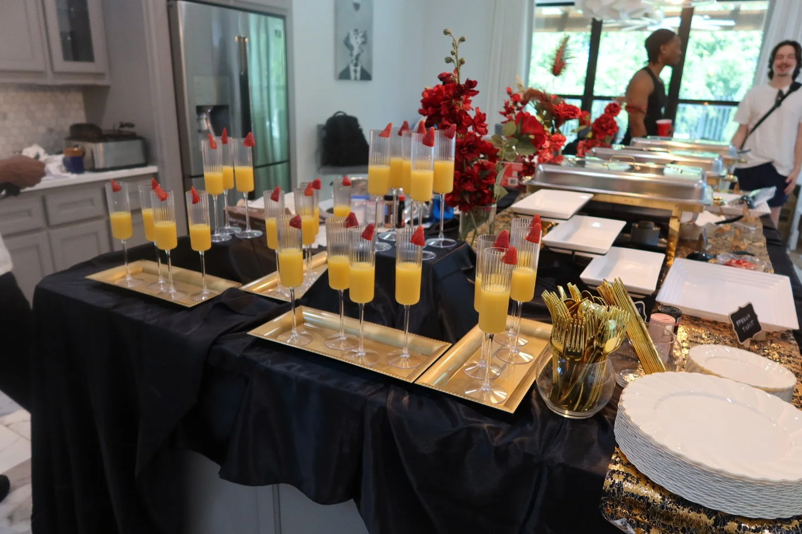 Elegant catering reception setup by The Culinary Gallery, Dallas - champagne service and gourmet buffet for corporate events and private celebrations