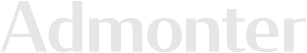 Das Bild zeigt das Wort 'Admonter' in großen weißen Buchstaben auf schwarzem Hintergrund.
