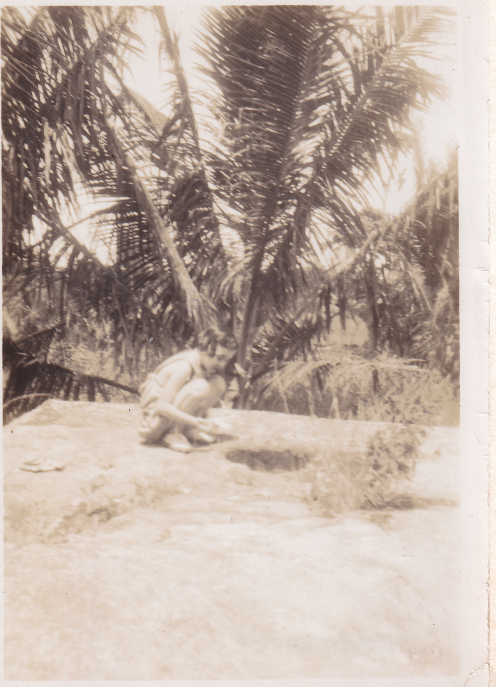 Pat on top of a concrete gun shelter after WWII, Kavieng