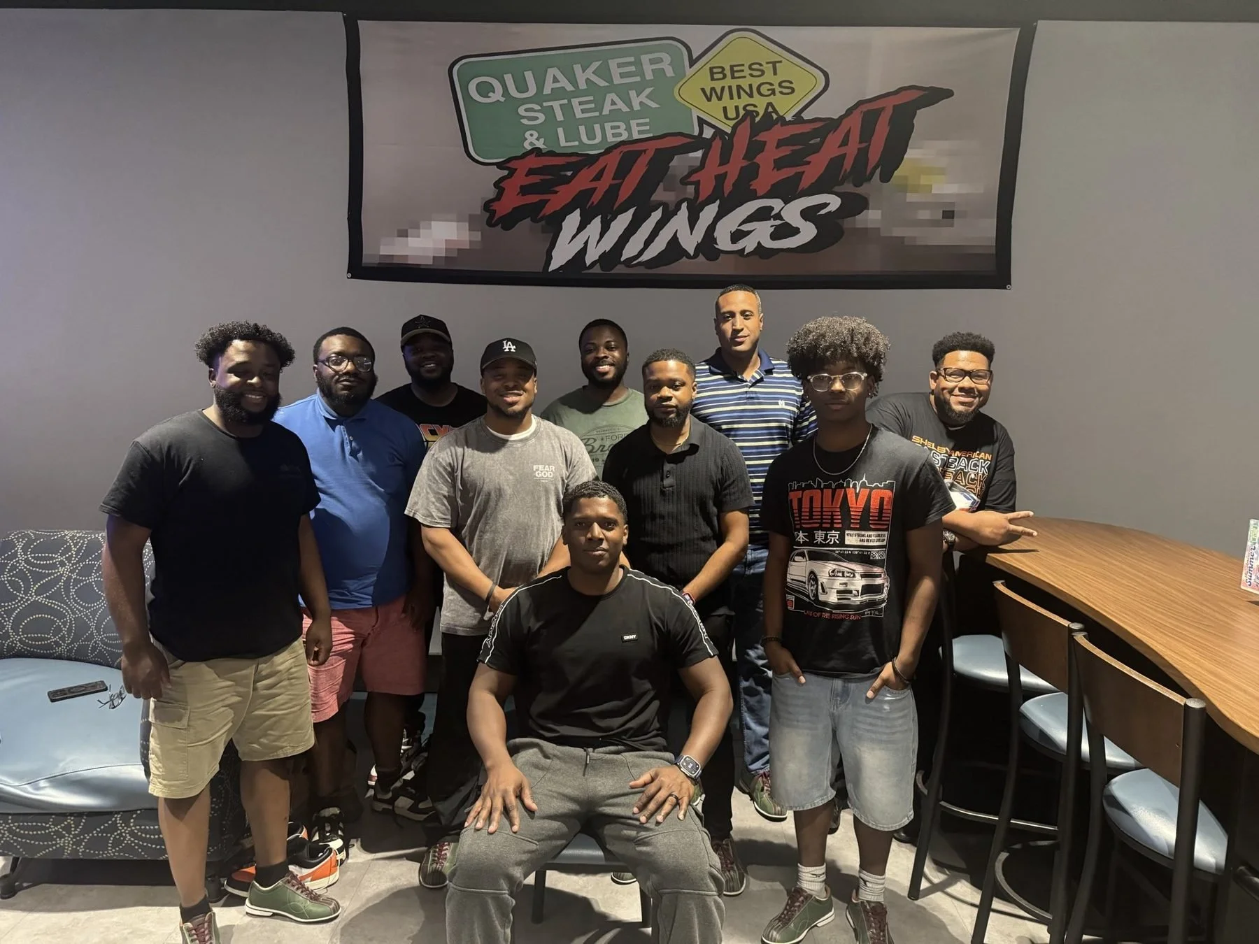 Men's fellowship gathering over wings with The Remnant Movement