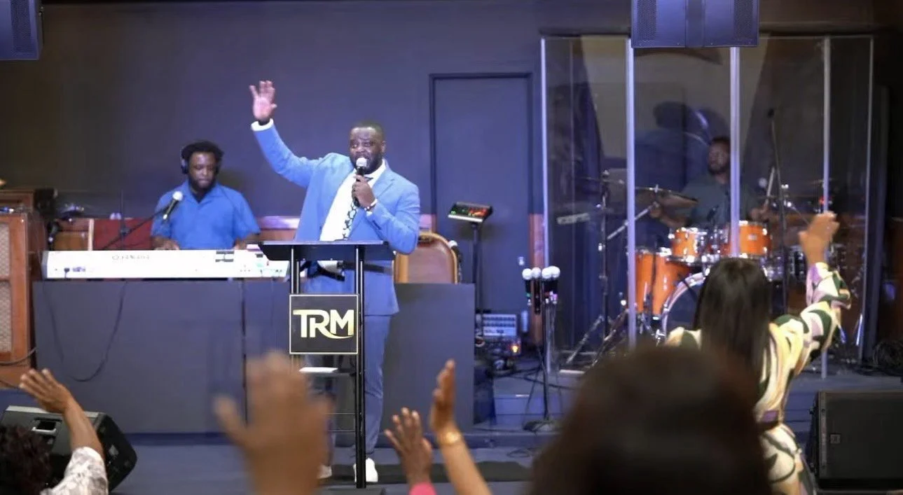 Pastor preaching during worship at The Remnant Movement