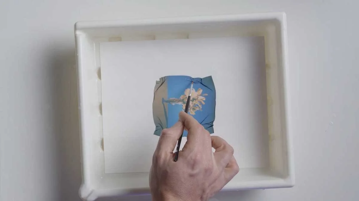 Wrinkling the edges of a polaroid lift as a creative effect.