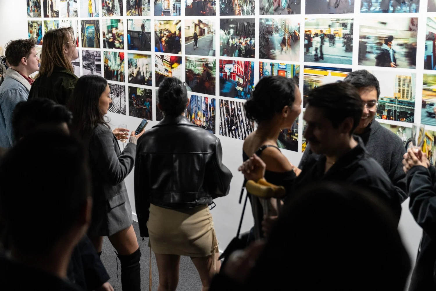 Visitors viewing artworks during an exhibition at Great Space Gallery