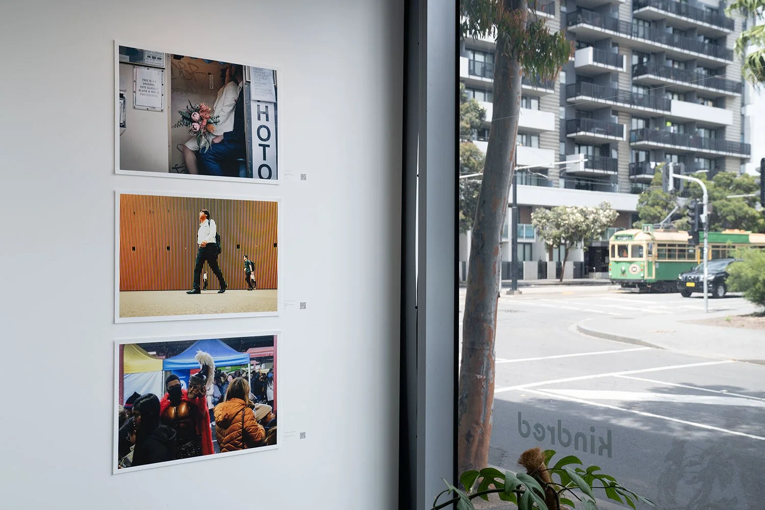 Gallery wall with artworks installed for a group exhibition