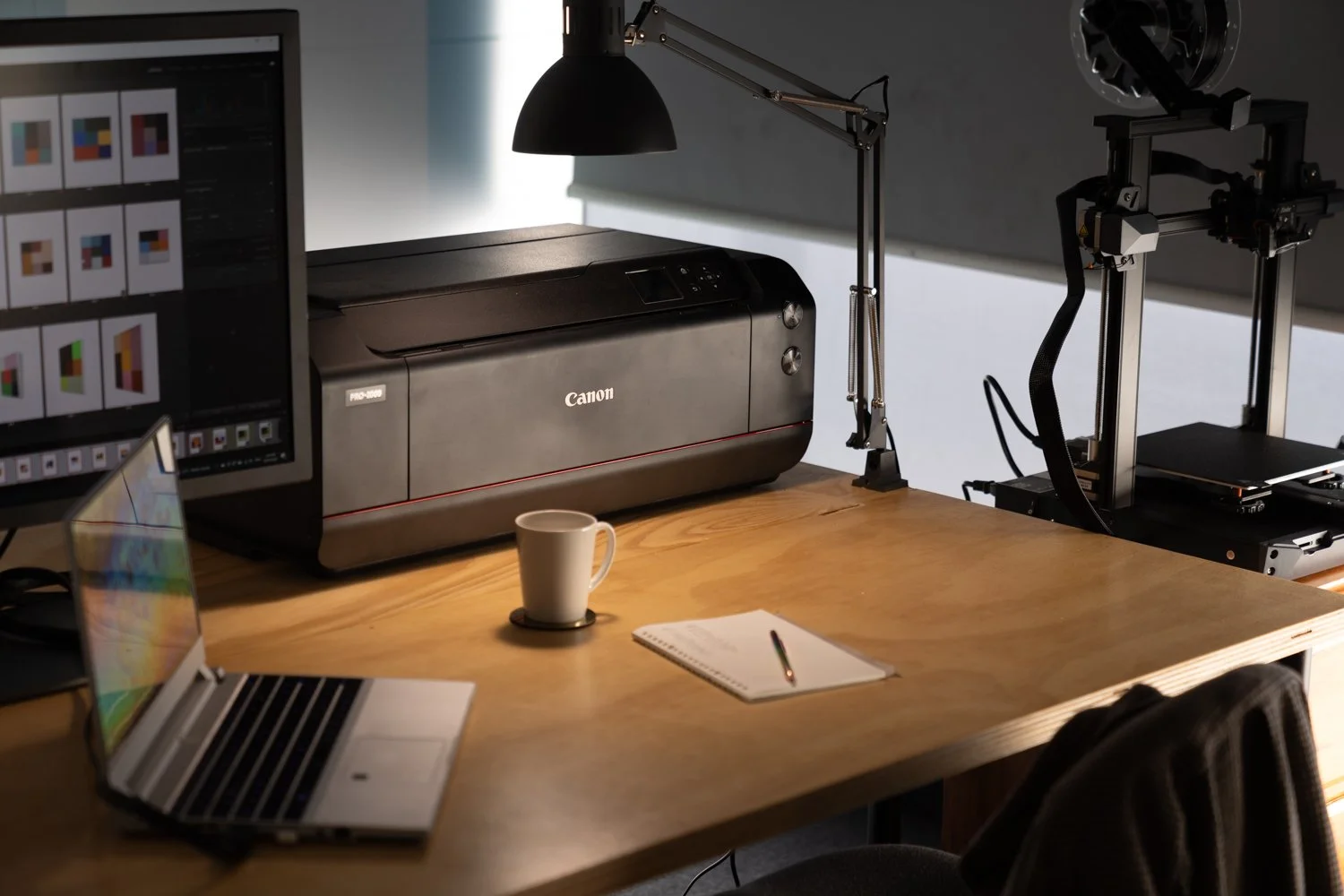 Photography editing workstation with wide-gamut display, Canon PRO-1000 photo printer, and film scanning equipment available to Great Space members.