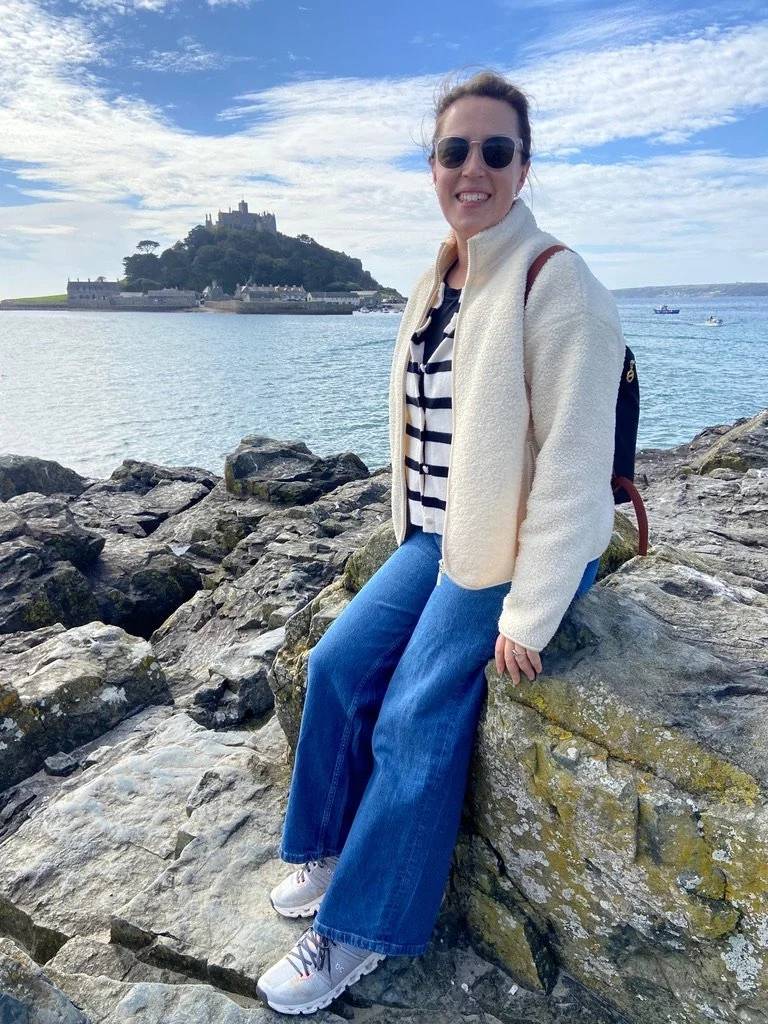 Morwenna on a rock in front of St Michael's Mount in Cornwall