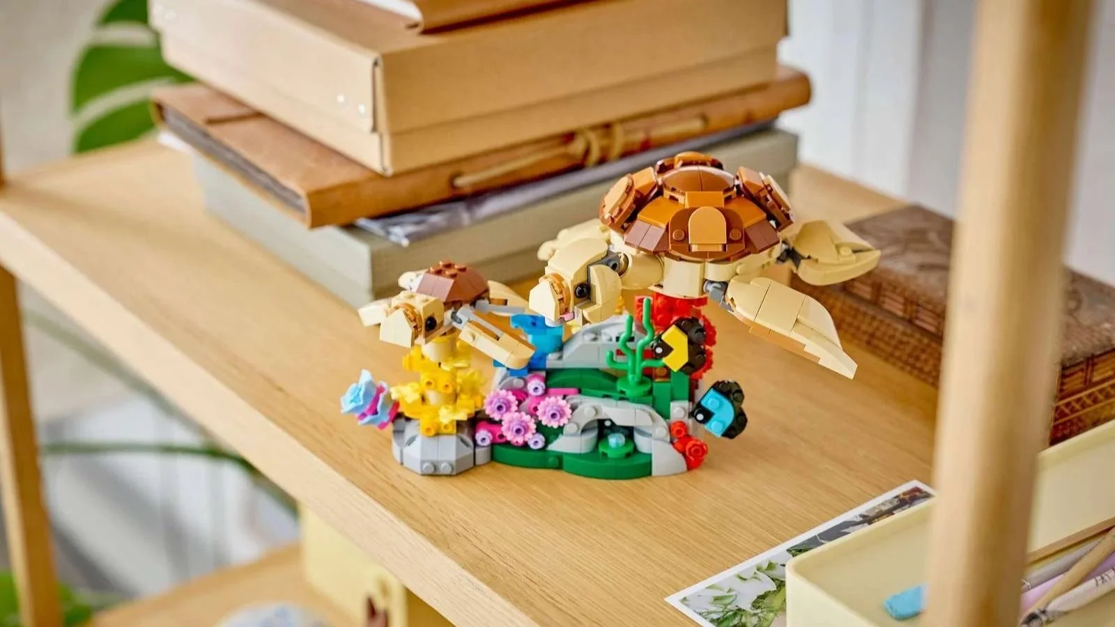 LEGO Family of Koalas set built as sea turtles, a large and small turtle resting on a coral reef base