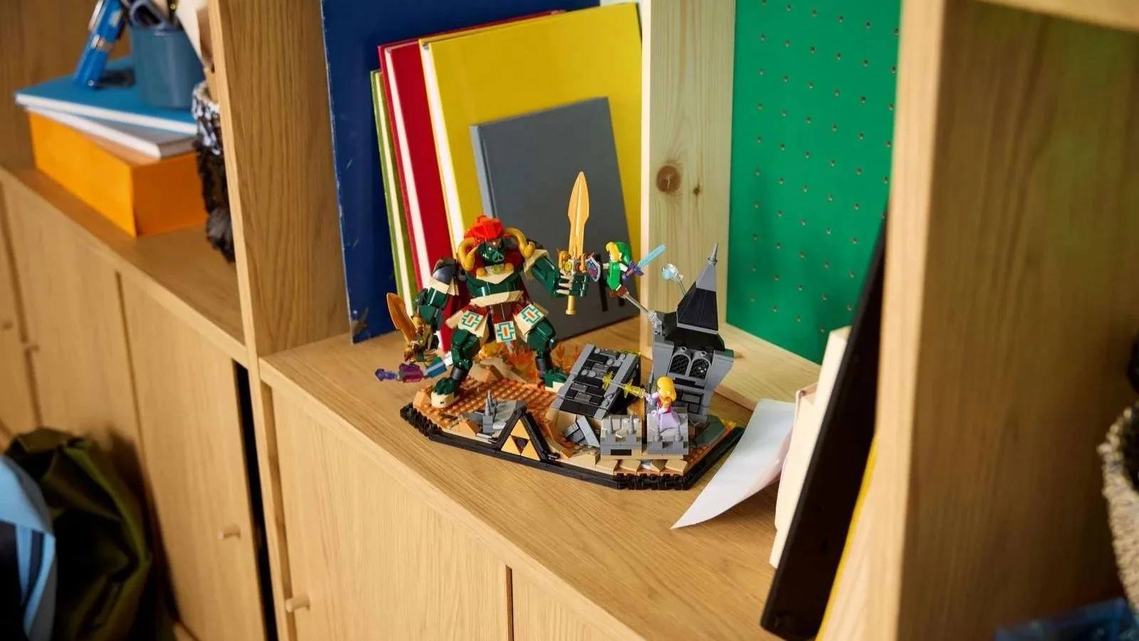 LEGO Ocarina of Time – The Final Battle set with Link and Ganon figures, displayed on a wooden shelf among books