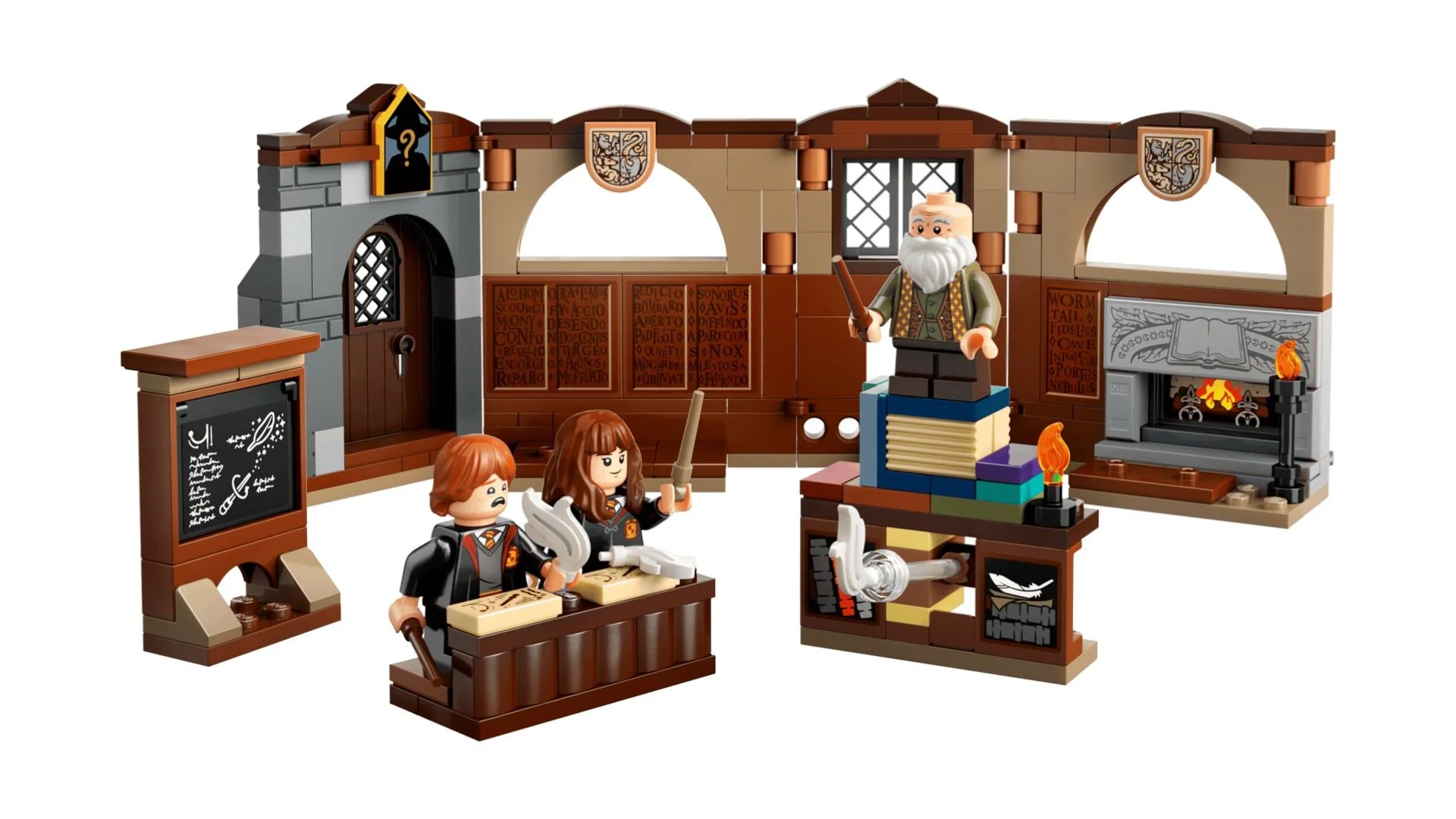 LEGO Harry Potter Hogwarts Castle Charms Class set with Ron and Hermione minifigures at a desk, a bearded professor on a stack of books, a chalkboard, and a fireplace