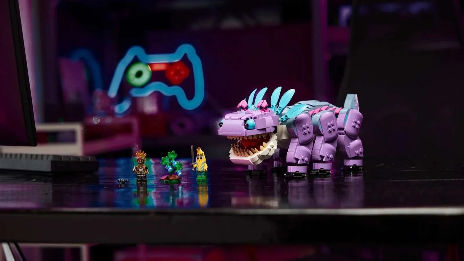 LEGO Fortnite Klombo set towering over three tiny minifigures on a dark desk lit with pink and purple neon