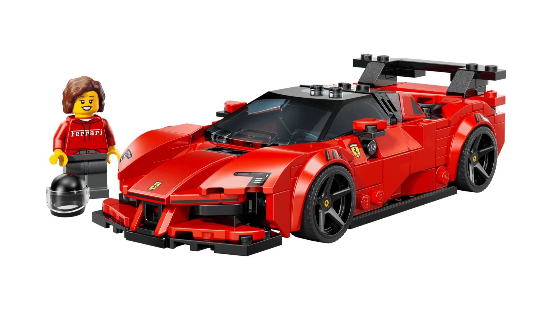 LEGO Ferrari SF90 XX Stradale sports car in red with a black rear wing, beside a minifigure in a Ferrari hoodie and a racing helmet