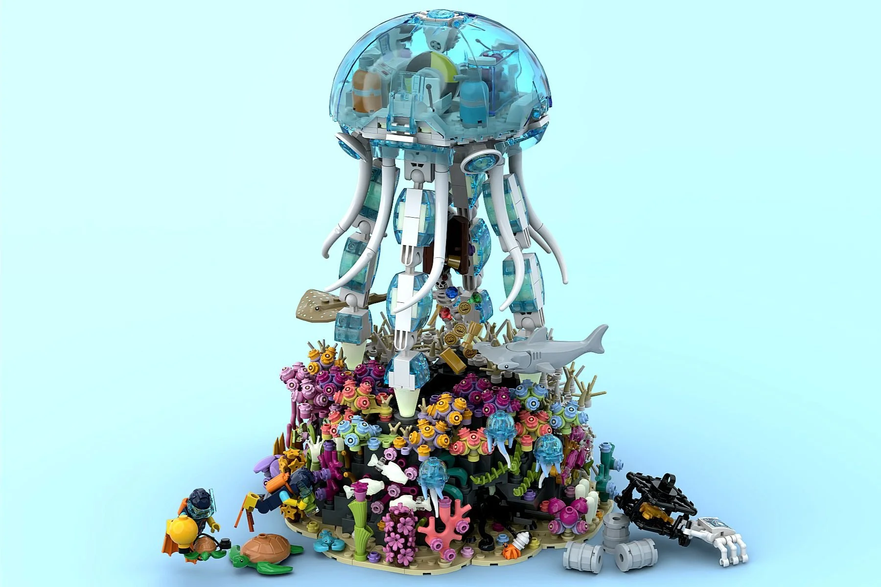 Digital render of the LEGO Ideas model Rocky Reef Restoration, showing a jellyfish-shaped submersible with a translucent blue dome standing on segmented tentacle legs above a coral reef base, with divers Minifigures, and colorful marine life.