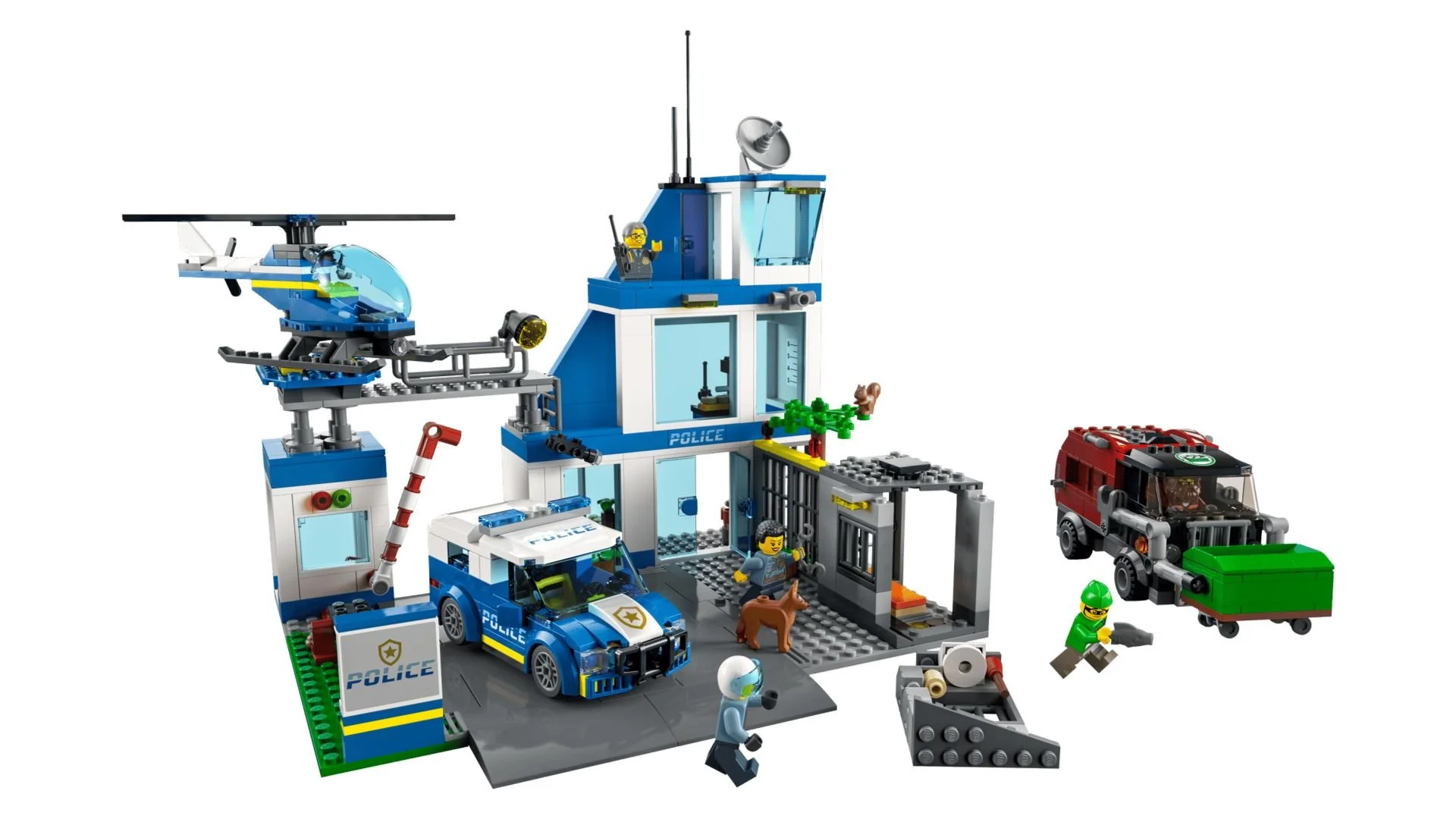 LEGO Police Station set with a blue and white building, helicopter pad, police car, police dog and a green getaway truck on a white background