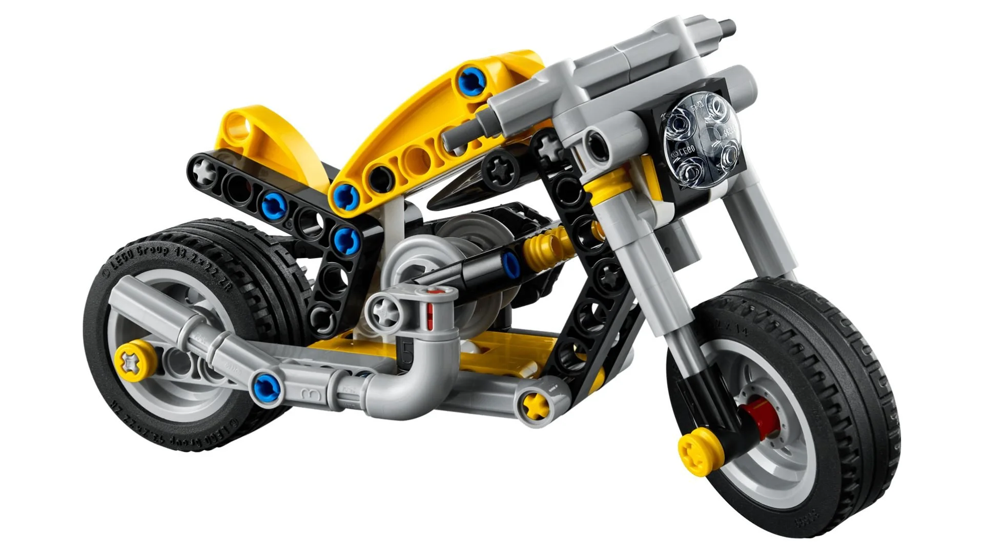 LEGO Yellow Motorcycle with a yellow frame, gray exhaust and black wheels on a white background