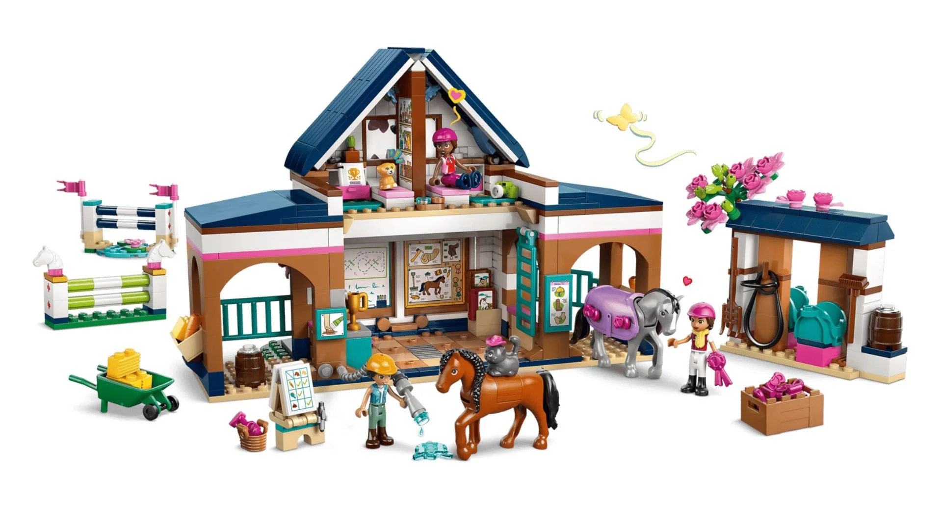 LEGO Friends Horse Stable and Riding Academy set with a blue-roofed stable, brown and gray horses, riders in helmets, show jumps, and a wheelbarrow of hay
