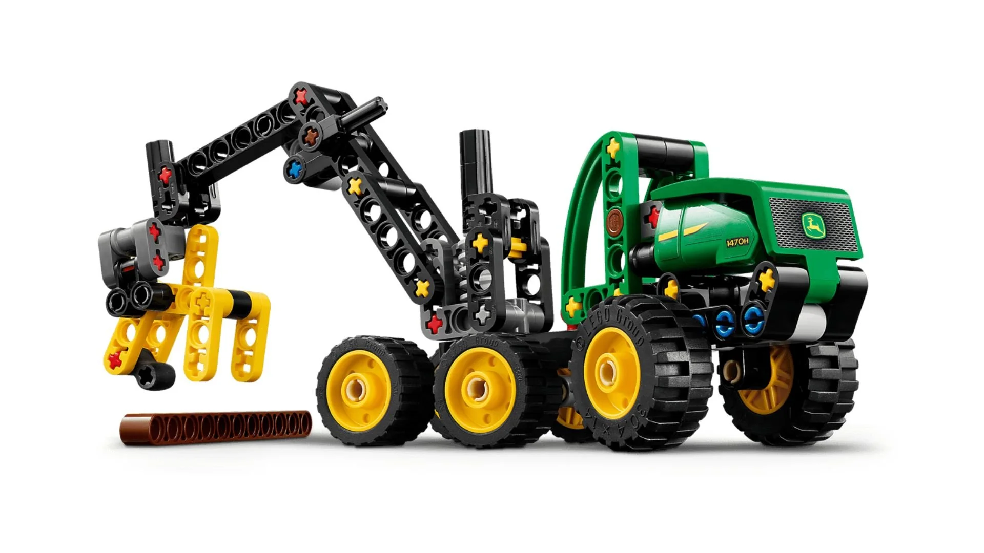John Deere 1470H Wheeled Harvester LEGO set in green and yellow with a raised crane arm and open grapple beside a brown log on a white background