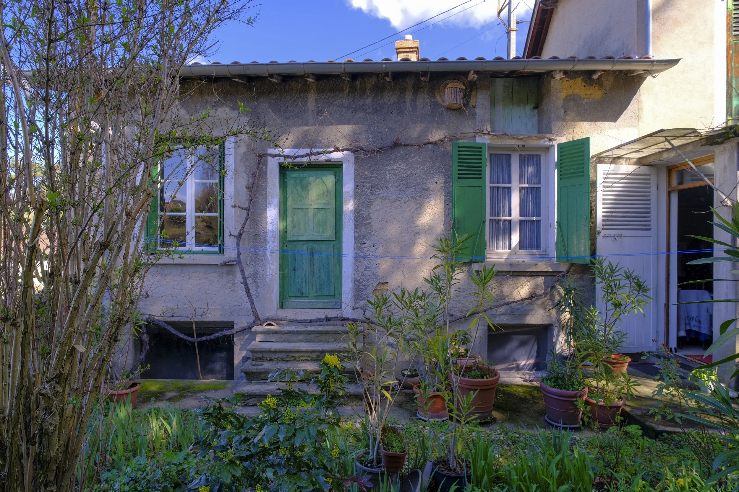 Rénovation d'une maison en pisé façade extérieure
