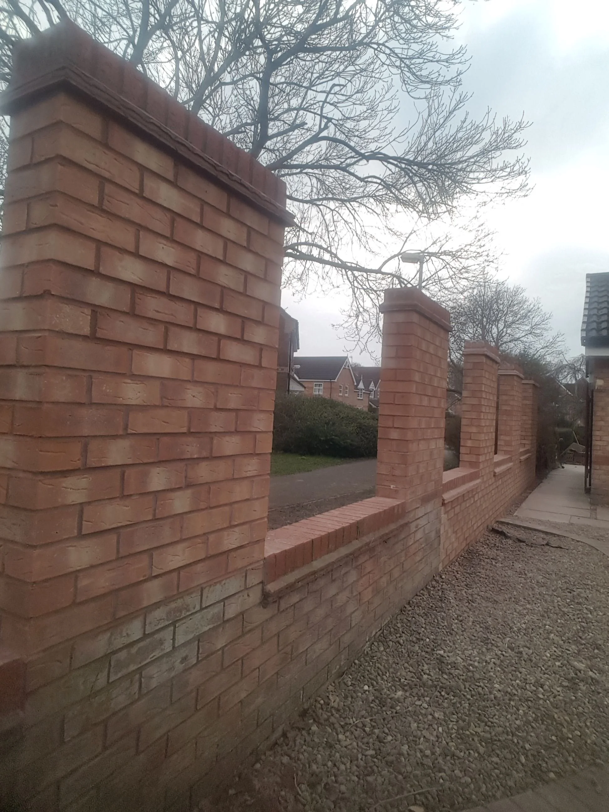 Re-Building-Of-A-Garden-Wall .jpg