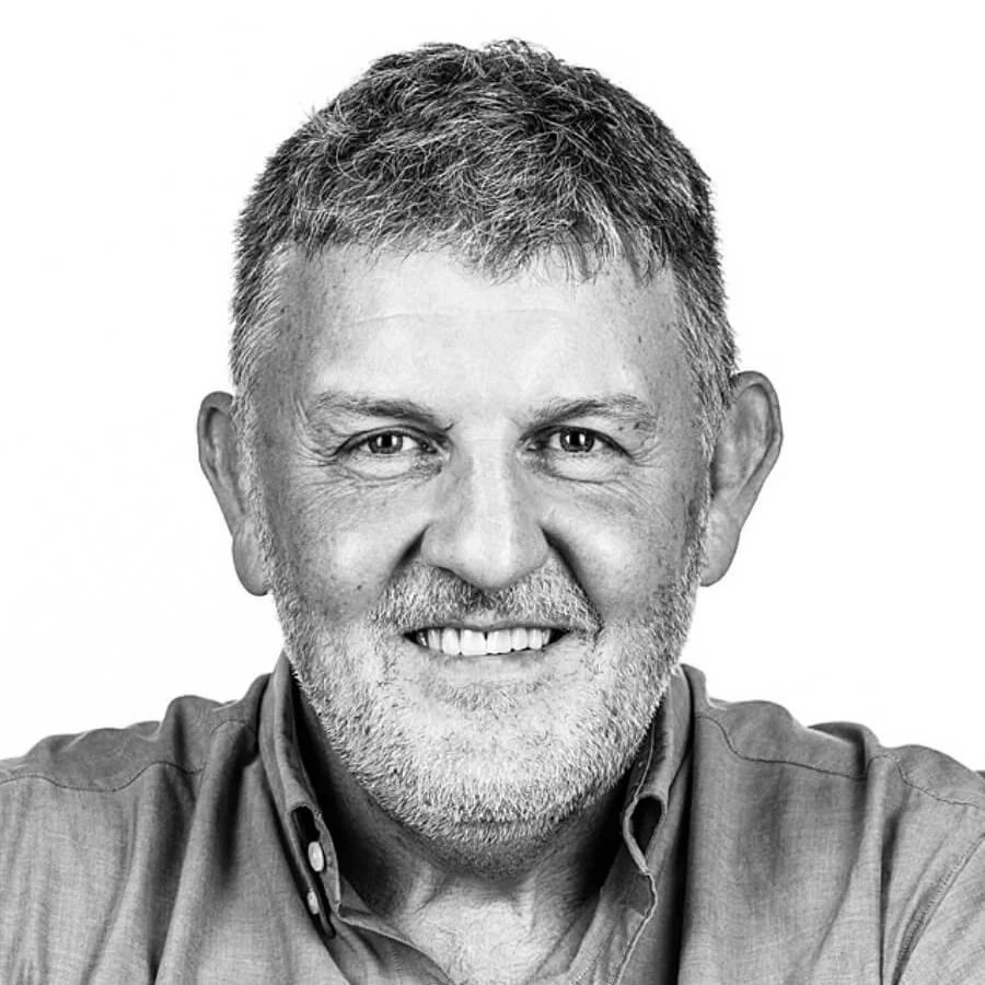 Black and white headshot of Professor Eliot