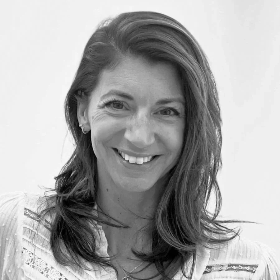 Black and white headshot of Gina