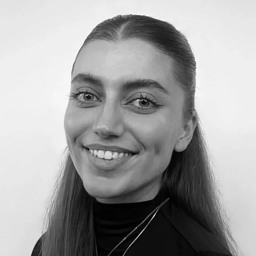 Black and white portrait of Anouk Asher, Researcher at Coulson Partners.
