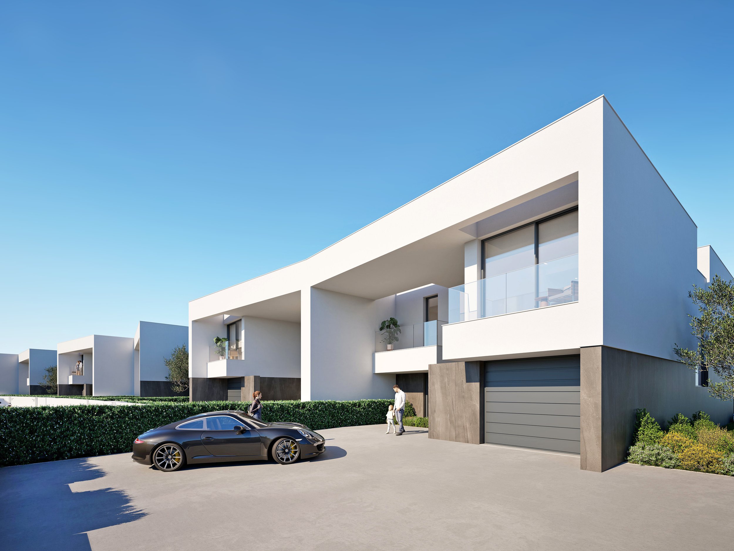 Modern white residential buildings with large balconies, a black sports car parked in front, and people walking along the sidewalk with greenery and trees around.