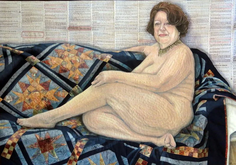 Life Quilt by Annabel Rainbow of woman posing on a colorful quilt with text in the background.