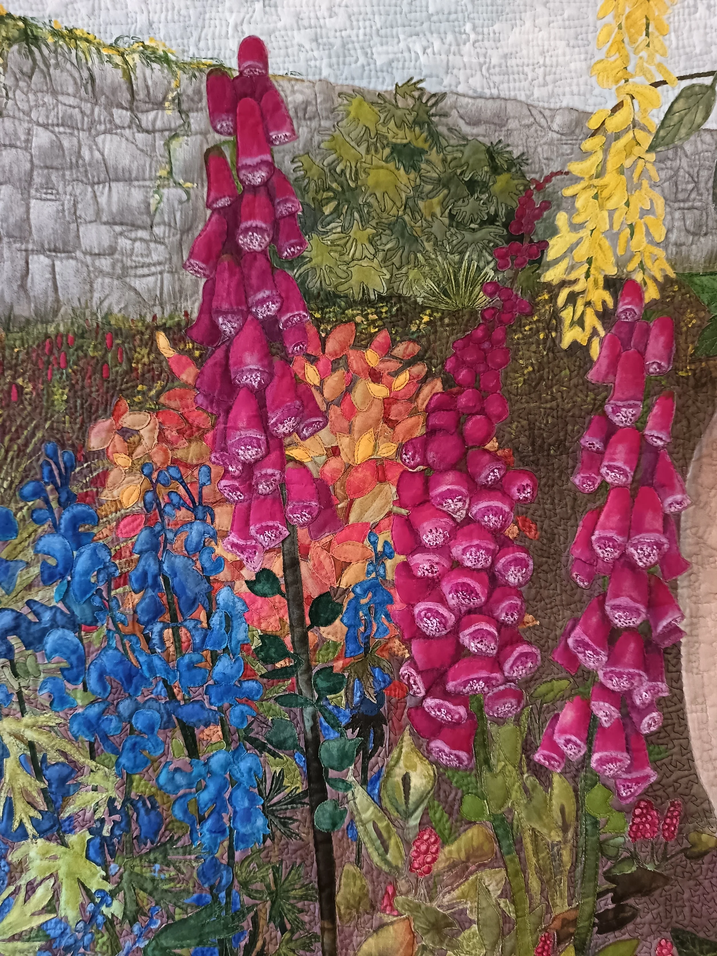 A detail from Poisonous Plant by Annabel Rainbow. Now in the collection of the Quilt Museum, York