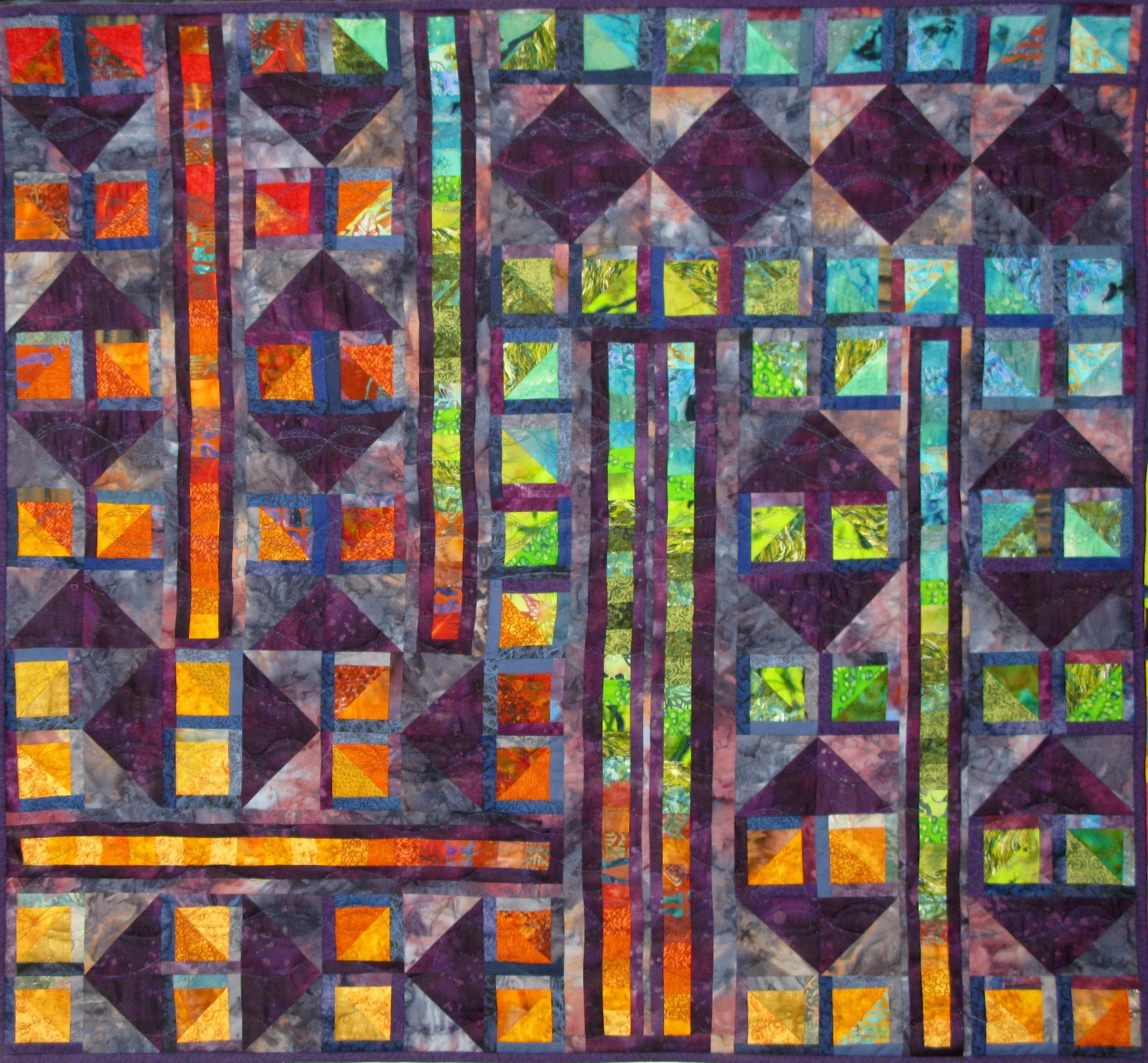 Colorful geometric quilt with vibrant patterns