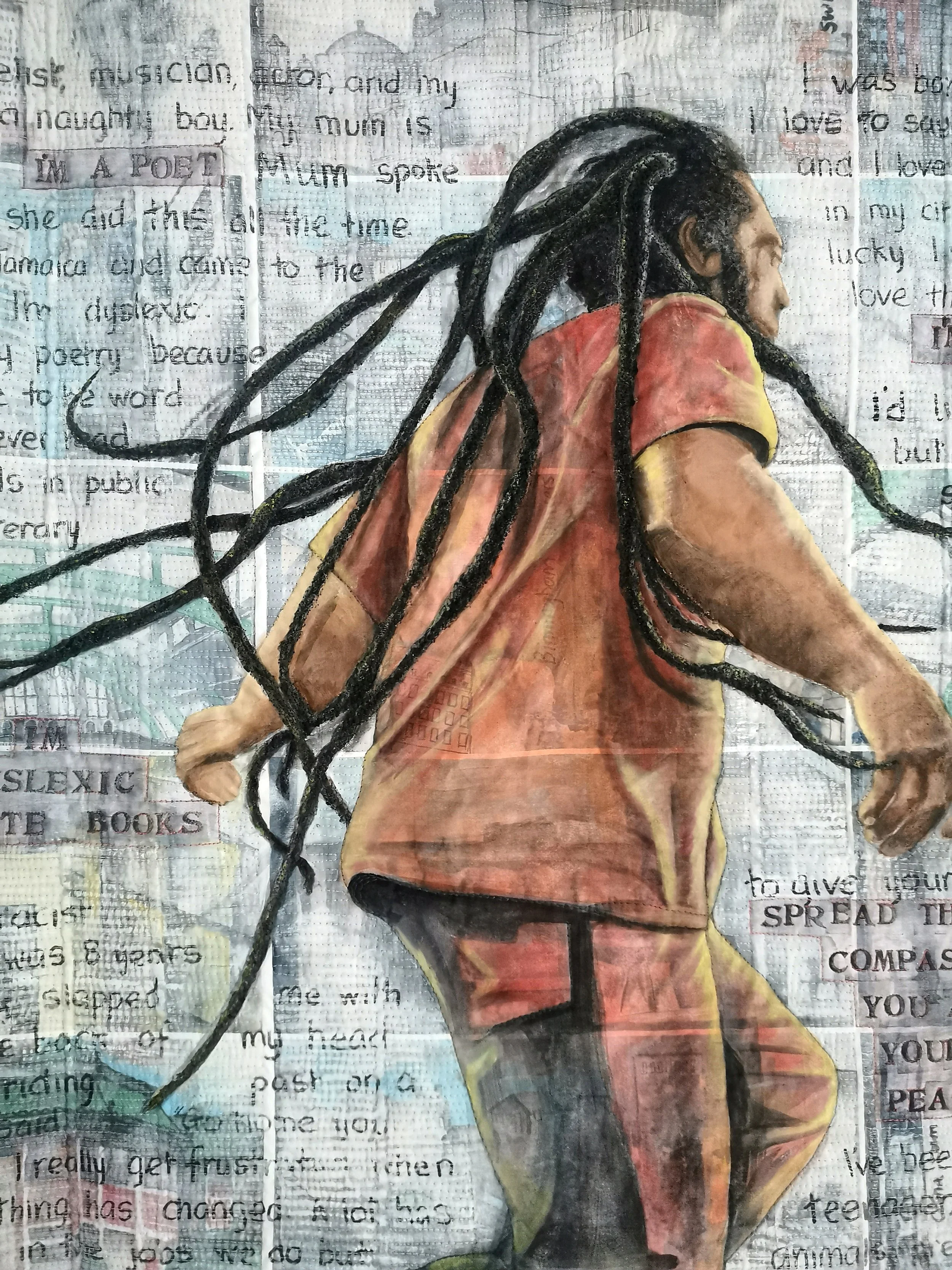 Benjamin Zephaniah on stage. Part of the Windrush Voices art quilt collection, by Annabel Rainbow