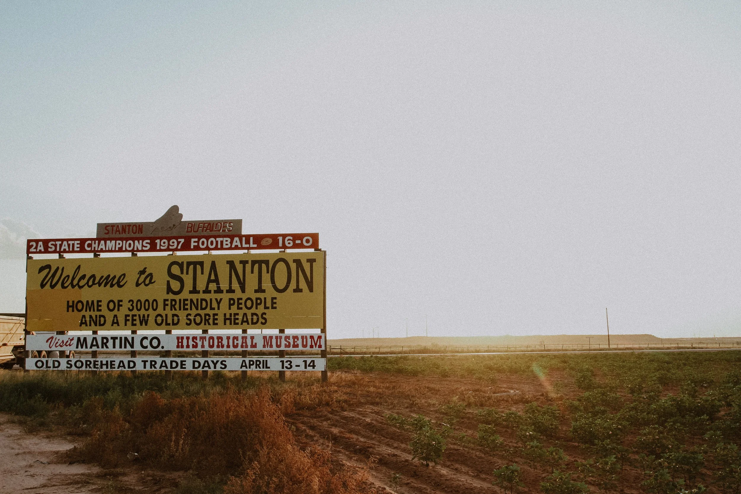 Welcome sign for Stanton, highlighting its football championship in 1997, with a mention of Old Sorrel Head Trade Days event on April 13-14, and advertising a visit to Martin County and its historical museum.