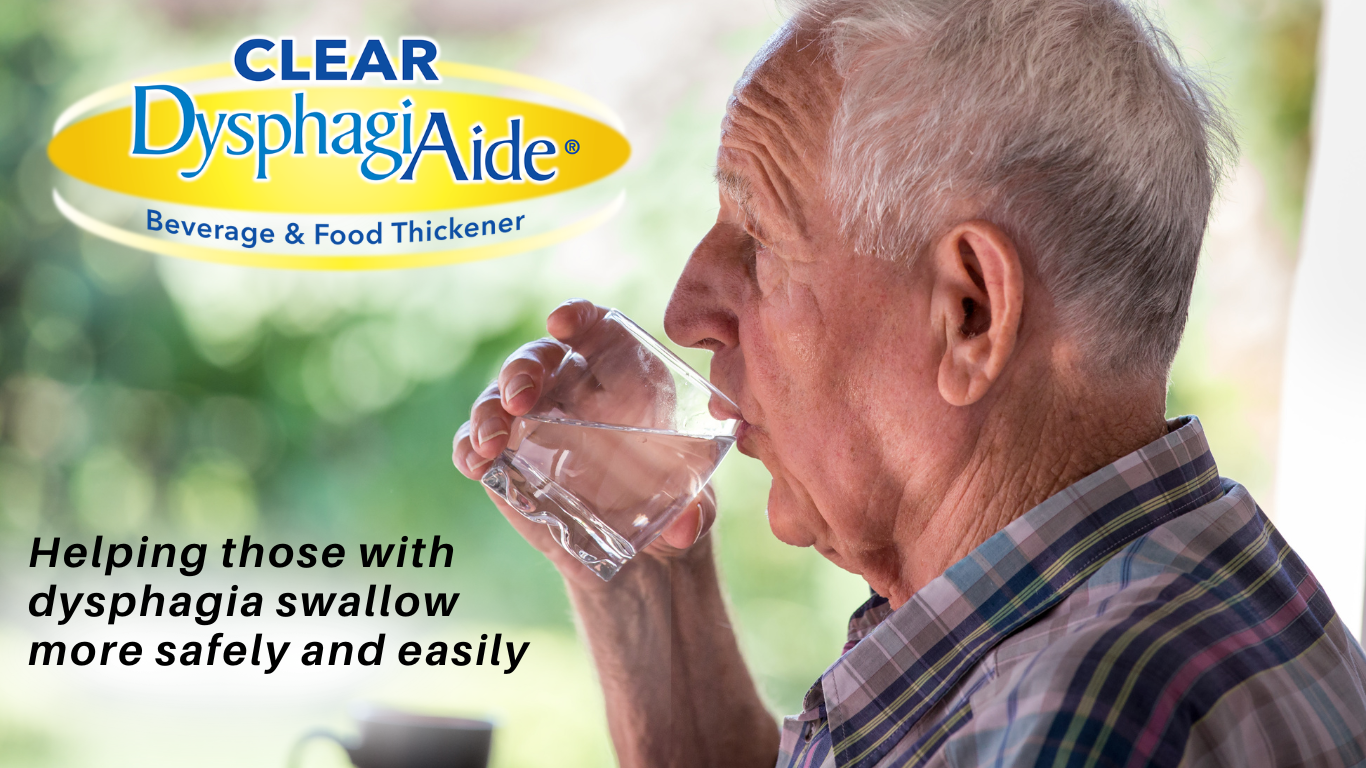 An elderly man with gray hair drinking a glass of water indoors with a blurry green outdoor background. Text overlay promoting DysphagiaAide beverage and food thickener.