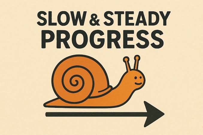 A cartoon snail with a smiling face, moving to the right, with the words "Slow & Steady Progress" above it. An arrow points to the right, emphasizing steady movement.