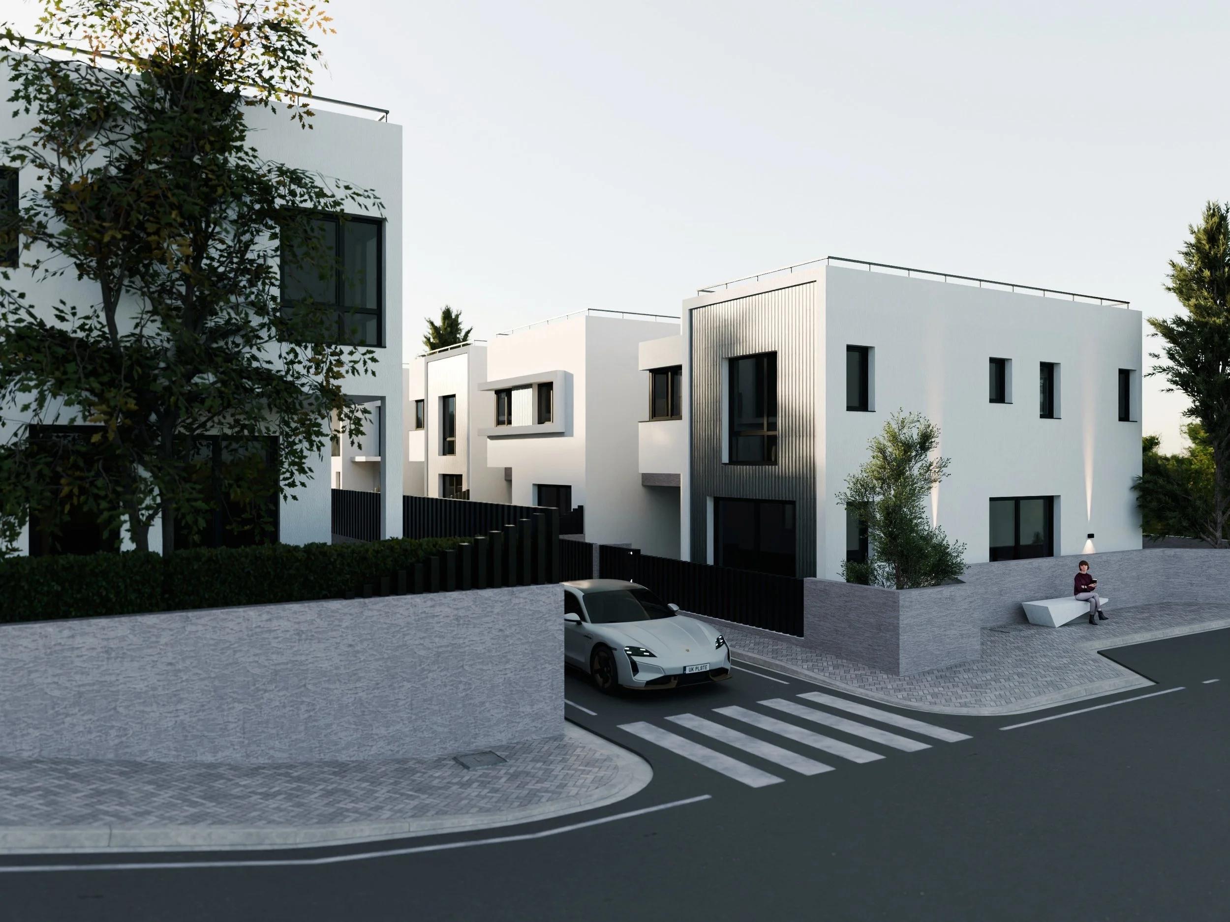 Striking the perfect balance between modern minimalism and suburban tranquility. Welcome to the exterior vision of the Seven Villas Complex.

Clean architectural lines, striking contrasts with bold black frames, and expansive glass facades define the