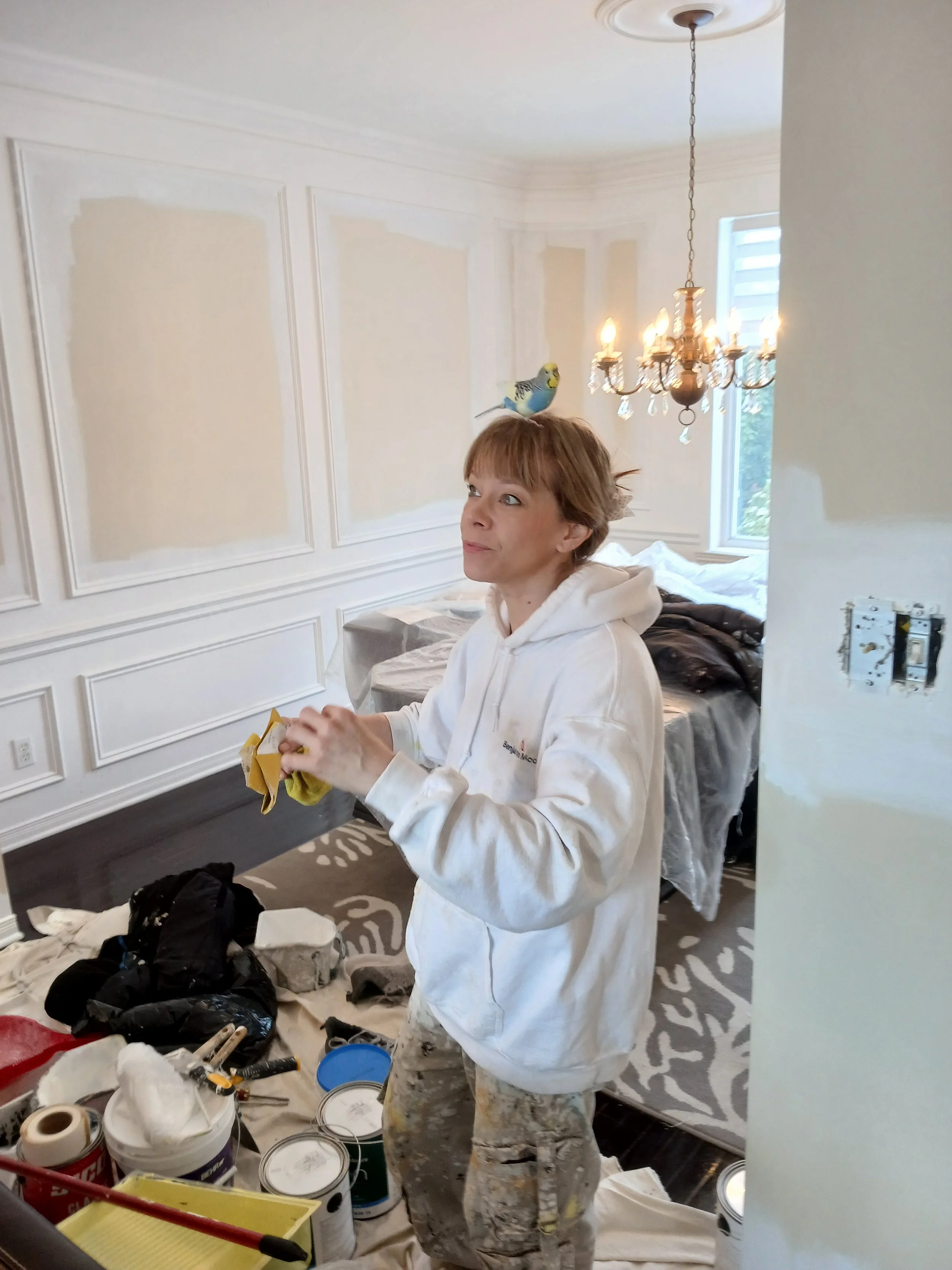 Amanda with a client’s bird at a work site