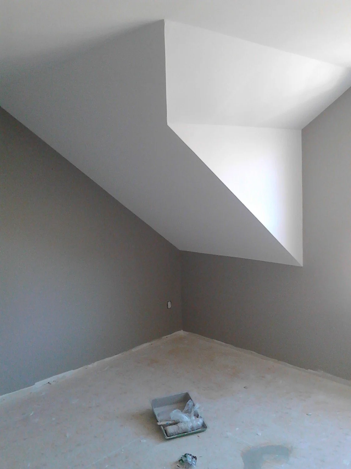 Beaconsfield bedroom with grey painted walls and white sloped ceiling