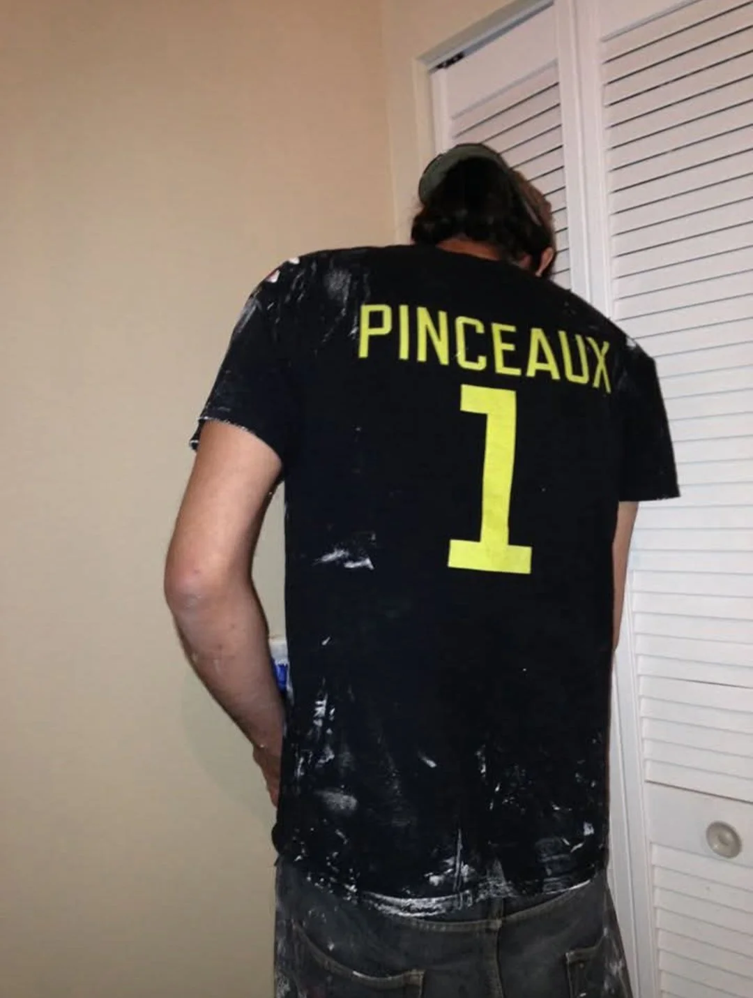 Joel in a bathroom painting project