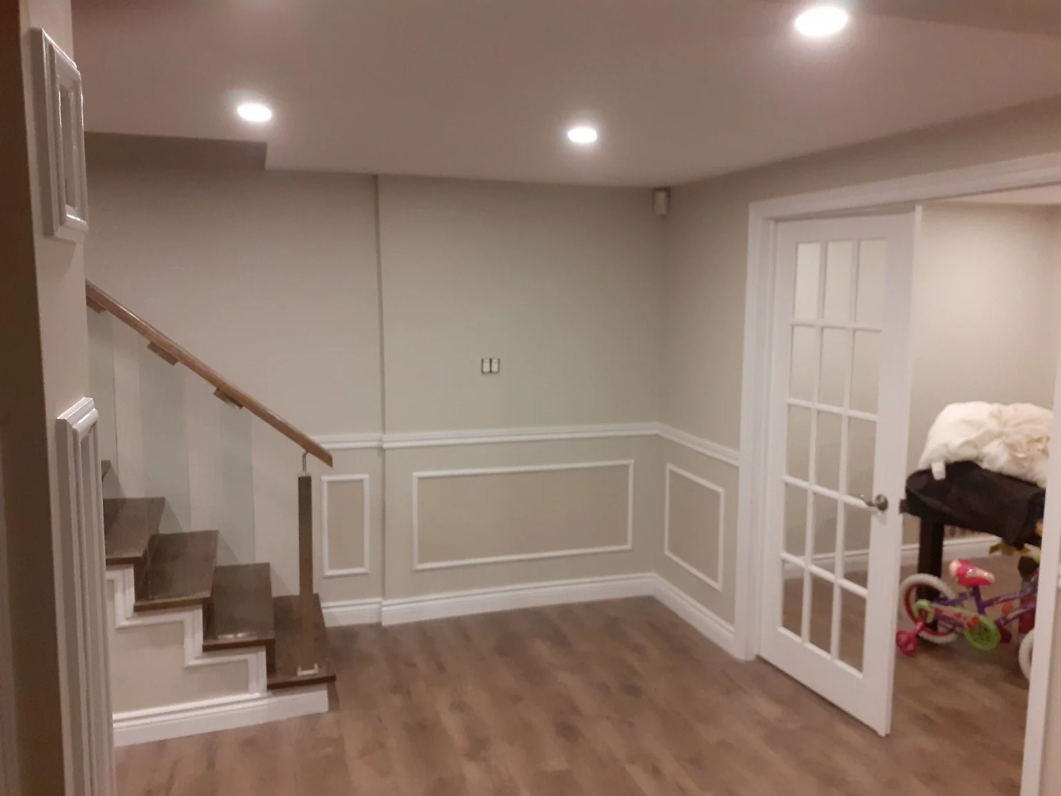 Basement interior with painted walls and decorative wall trim