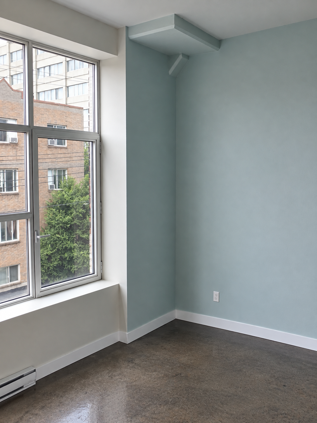 Griffintown condo interior with a pink painted accent wall