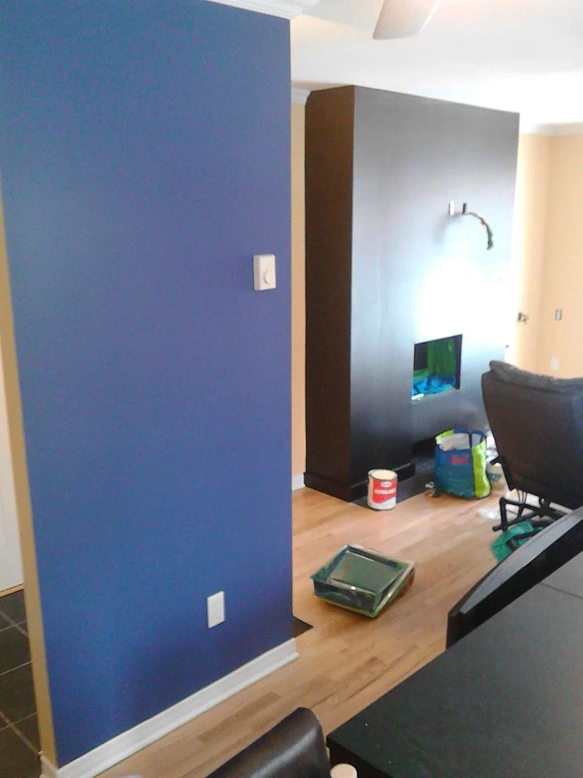 Interior with a solid blue painted feature wall
