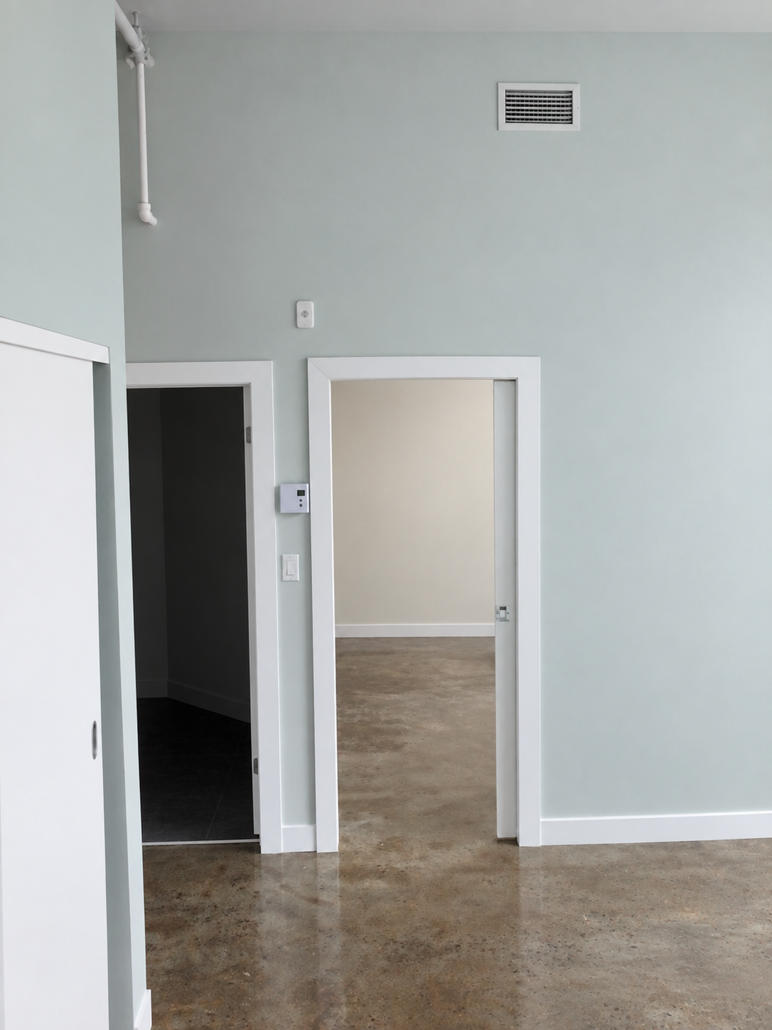 Griffintown condo interior painting around the entry and doorways between rooms