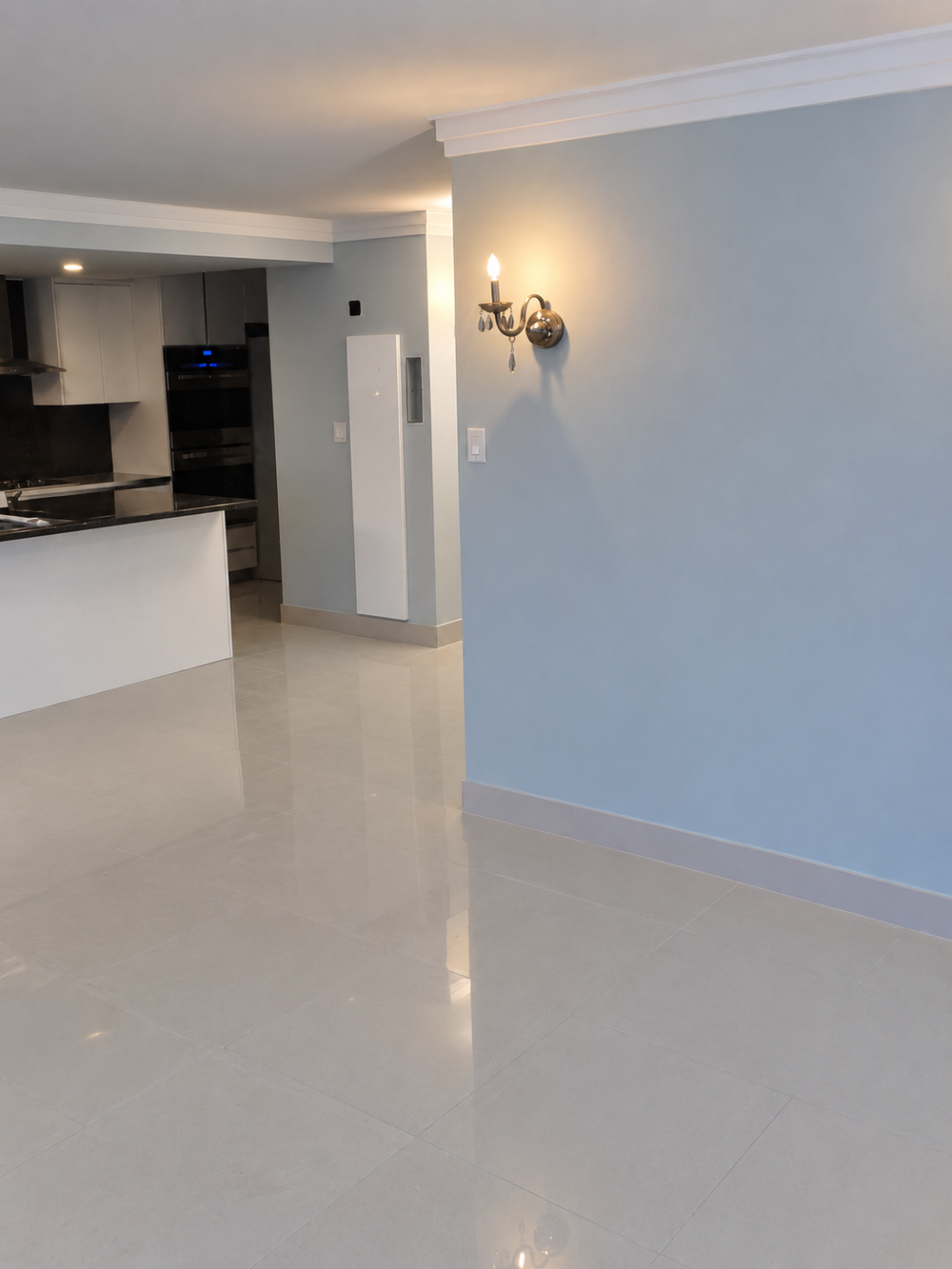 Blue accent wall in a condo interior