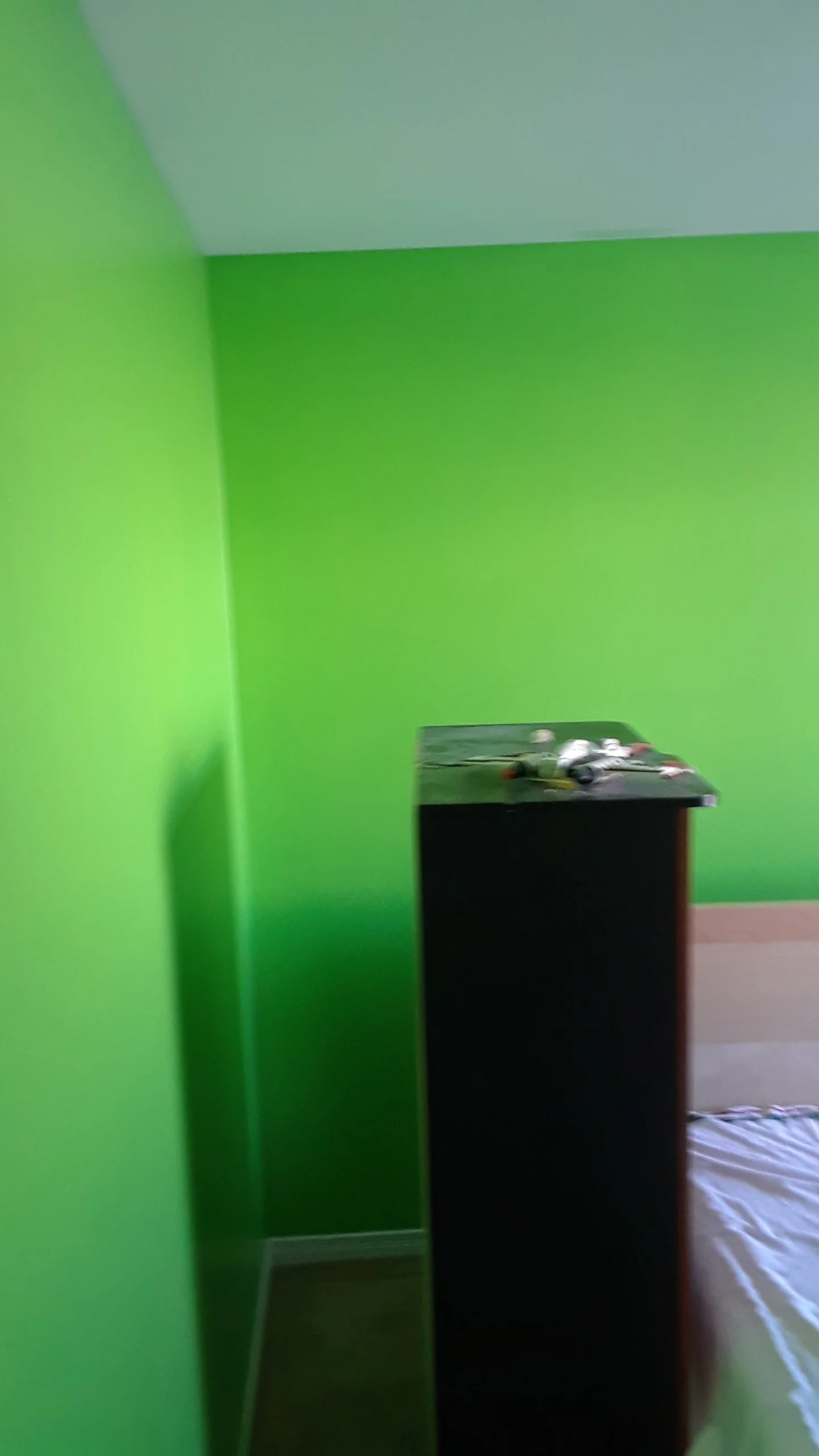 Room with green painted walls in a residential interior