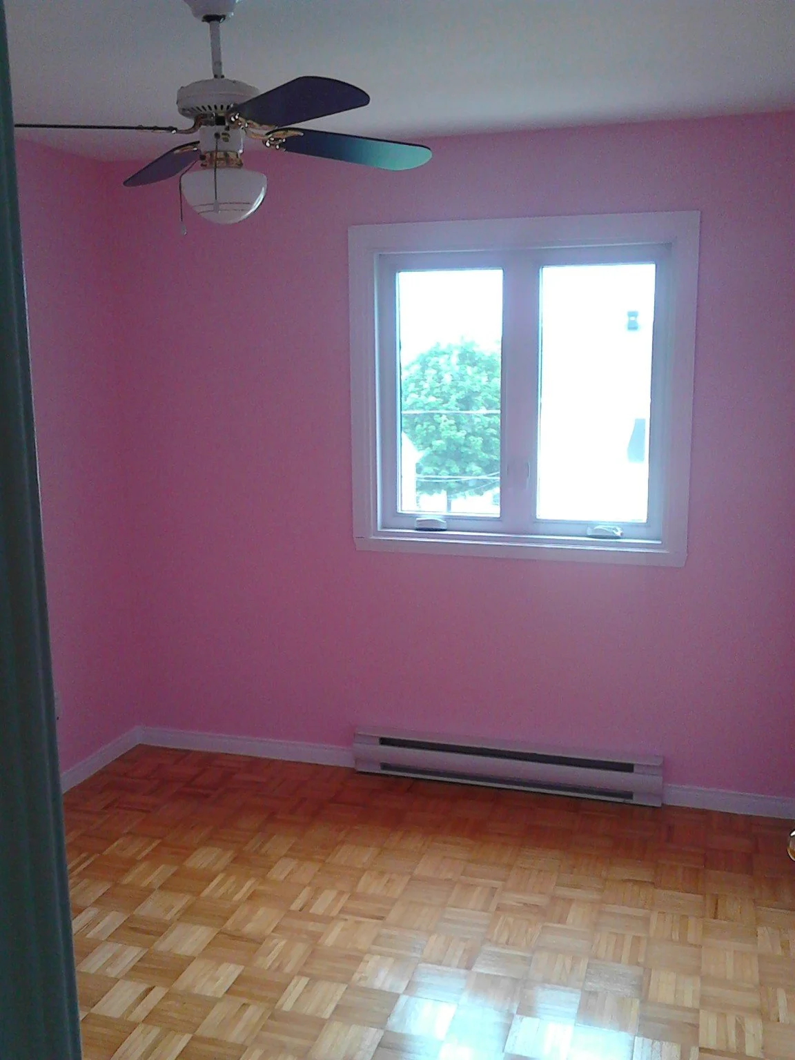 Residential room with pink painted walls